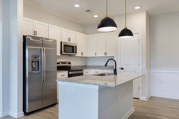 Large kitchen islands with storage and pendant lighting*